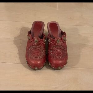 Classy gold riveted designer clogs